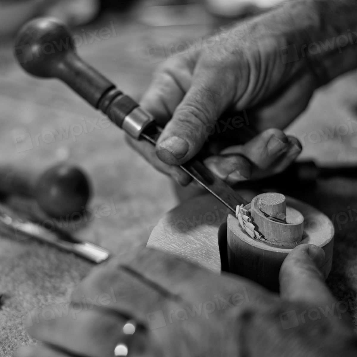 A craftsperson's hands at work with their tools — the hardest foundation is already in those hands